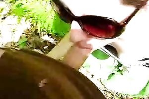 Slutty cheating neighbour doxy giving head outdoors