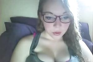 Slutty nerdy serious looking web camera gal bragged of her big boobies