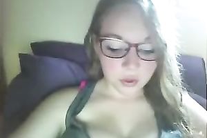 Slutty nerdy serious looking web camera gal bragged of her big boobies