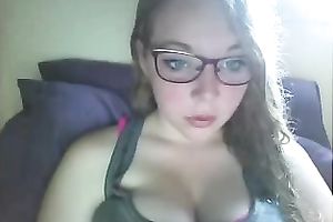 Slutty nerdy serious looking web camera gal bragged of her big boobies