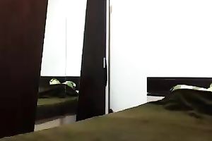 Seductive dark brown babe engulfing her own nipples