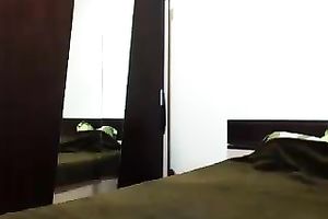 Seductive dark brown babe engulfing her own nipples