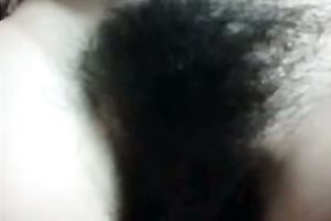 Pretty dark brown hottie with merry bumpers flashes her hairy love tunnel on livecam