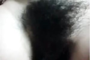 Pretty dark brown hottie with merry bumpers flashes her hairy love tunnel on livecam