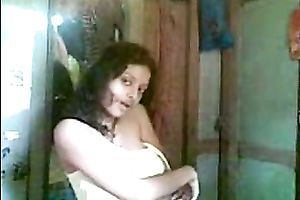 Cute shaggy haired Desi gal flashed her meatballs during the time that stripping on camera