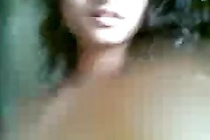 Cute shaggy haired Desi gal flashed her meatballs during the time that stripping on camera