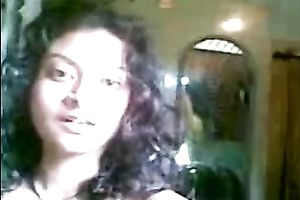 Cute shaggy haired Desi gal flashed her meatballs during the time that stripping on camera