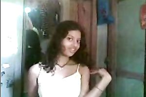 Cute shaggy haired Desi gal flashed her meatballs during the time that stripping on camera