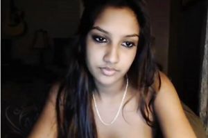 Sexy slim and lengthy haired Desi cam playgirl positions in the evening