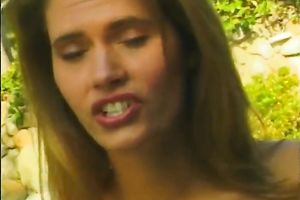 Svelte light-haired hottie provides man with oral-job outdoors