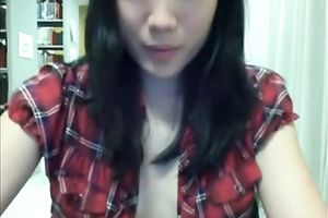Quite nasty slim Asian amateur wife flashes her wobblers on webcam in the library