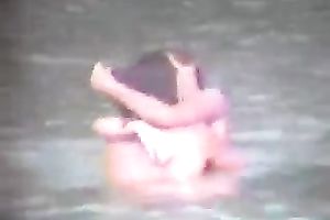 Sexy pair of blonde people getting horny and cuddly on the beach