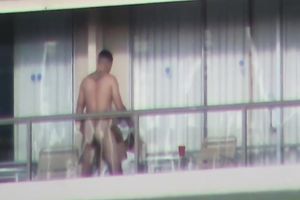 Spy clip of beefy muscular guy fucking excited black cock sluts on a balcony