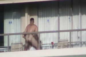 Spy clip of beefy muscular guy fucking excited black cock sluts on a balcony