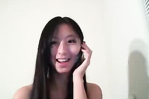 Here again I call this slender Asian web camera wench for phone sex