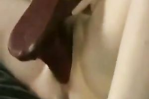 Big plastic sex toy reaming her constricted and soaked snatch