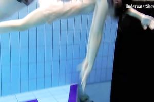 Slender pale skin Russian harlots in the pool undressed