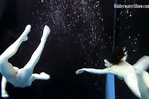Slender pale skin Russian harlots in the pool undressed