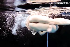 Slender pale skin Russian harlots in the pool undressed