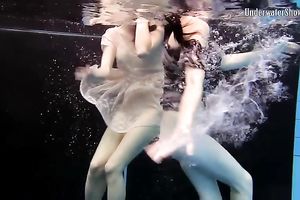 Slender pale skin Russian harlots in the pool undressed