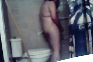 My concupiscent overweight dark brown wife masturbates her fur pie on the latrine bowl