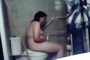 My concupiscent overweight dark brown wife masturbates her fur pie on the latrine bowl
