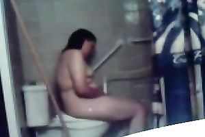 My concupiscent overweight dark brown wife masturbates her fur pie on the latrine bowl
