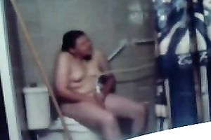 My concupiscent overweight dark brown wife masturbates her fur pie on the latrine bowl