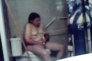 My concupiscent overweight dark brown wife masturbates her fur pie on the latrine bowl