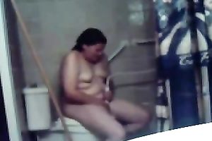 My concupiscent overweight dark brown wife masturbates her fur pie on the latrine bowl
