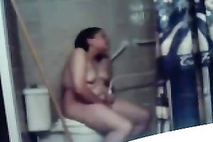 My concupiscent overweight dark brown wife masturbates her fur pie on the latrine bowl