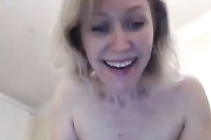 Mature blonde mommy pushing soaked pussy with large sex toy