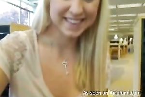 Hilarious buxom blondie flashes her boobies and masturbates in cafe