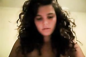 My curly-haired ex GF fingers her muff in cam solo scene