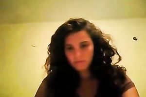 My curly-haired ex GF fingers her muff in cam solo scene