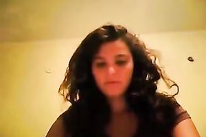 My curly-haired ex GF fingers her muff in cam solo scene