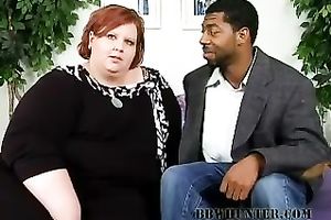 SSBBW ginger slut tries to give a deepthroat to the dark man
