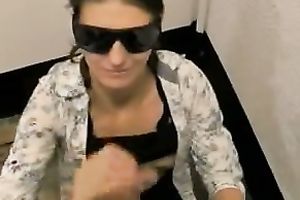 Girlfriend wears dark sunglasses and waits to be facialized
