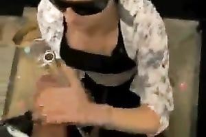 Girlfriend wears dark sunglasses and waits to be facialized