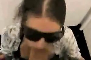 Girlfriend wears dark sunglasses and waits to be facialized