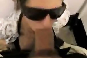 Girlfriend wears dark sunglasses and waits to be facialized