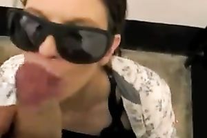 Girlfriend wears dark sunglasses and waits to be facialized