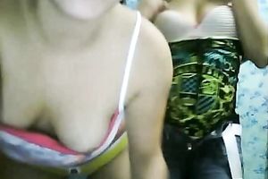 Two beautiful Latina web camera nubiles show off their round asses