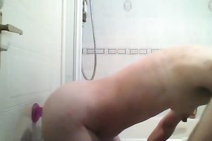 Lewd whore lets the thing stick to the wall and then this babe copulates herself with it