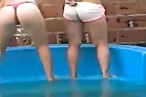 Sexy honeys playing with every other on a garden pool in my yard