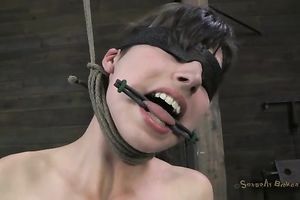 Slender fastened up brunette sits on chair and receives face hole banged