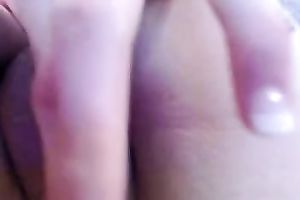 Emo legal age teenager playing with soaking pink wet crack in non-professional session