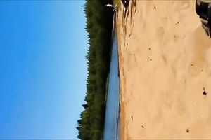 Lusty wife of my buddy sucked and kinda wanked his flaccid dick on the beach