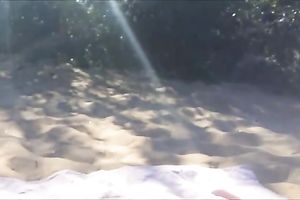 Lusty wife of my buddy sucked and kinda wanked his flaccid dick on the beach