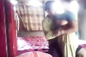 Dark haired dilettante Desi wifey in sari provides her hubby with BJ